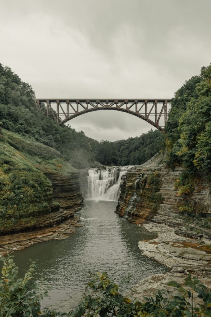 Scenic view of road trip spots in New York, featuring Ithaca, Watkins Glen, and Niagara Falls.