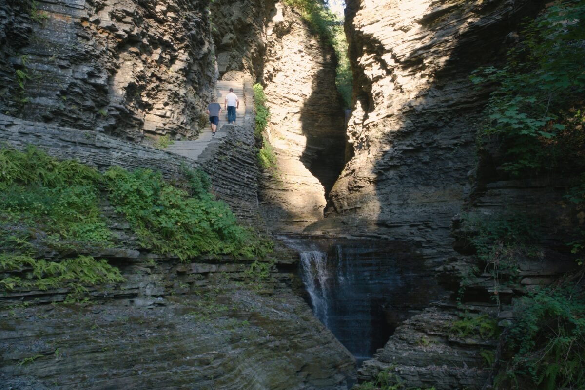 Scenic view of road trip spots in New York, featuring Ithaca, Watkins Glen, and Niagara Falls.